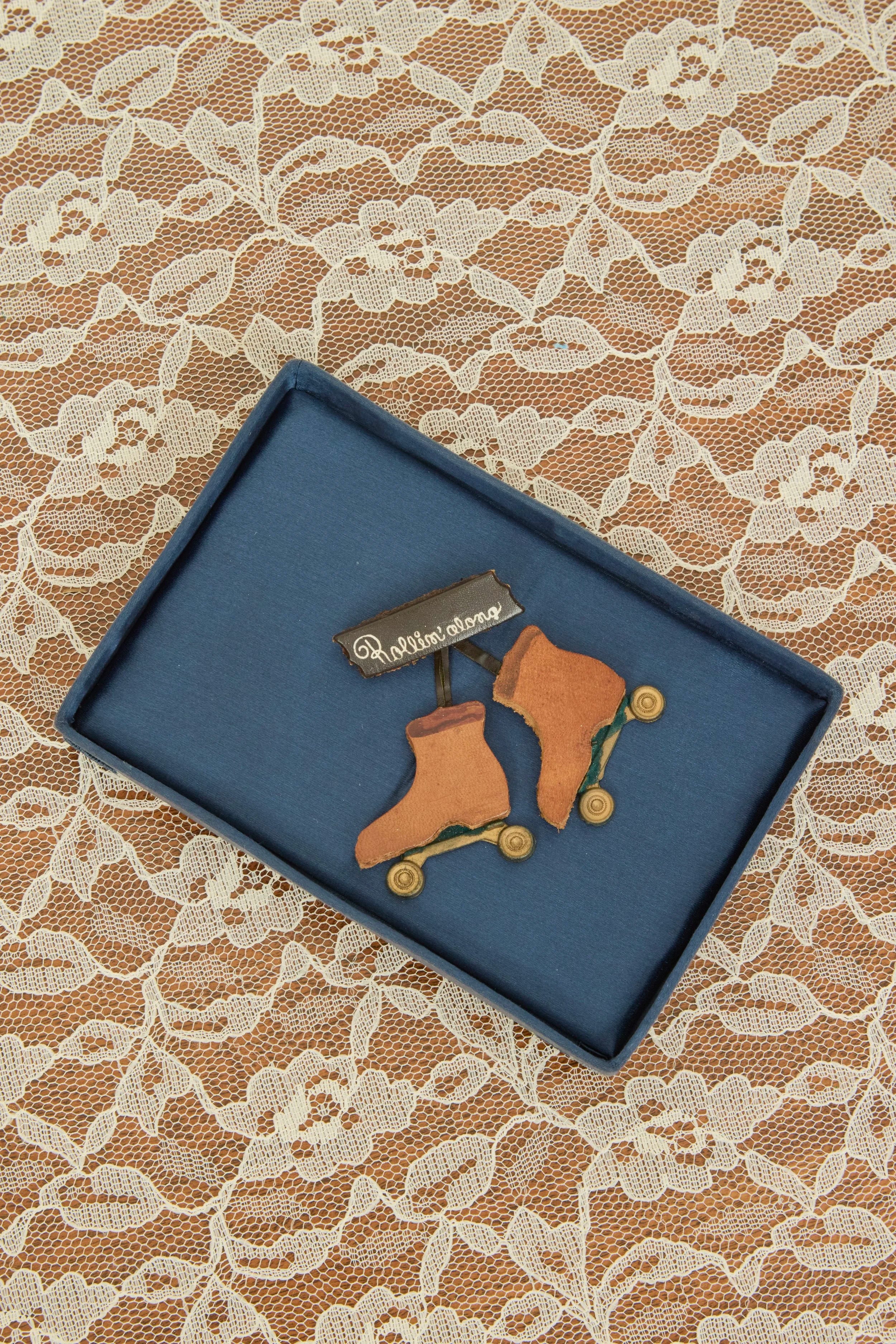 Vintage "Rollin' Along" Leather Brooch