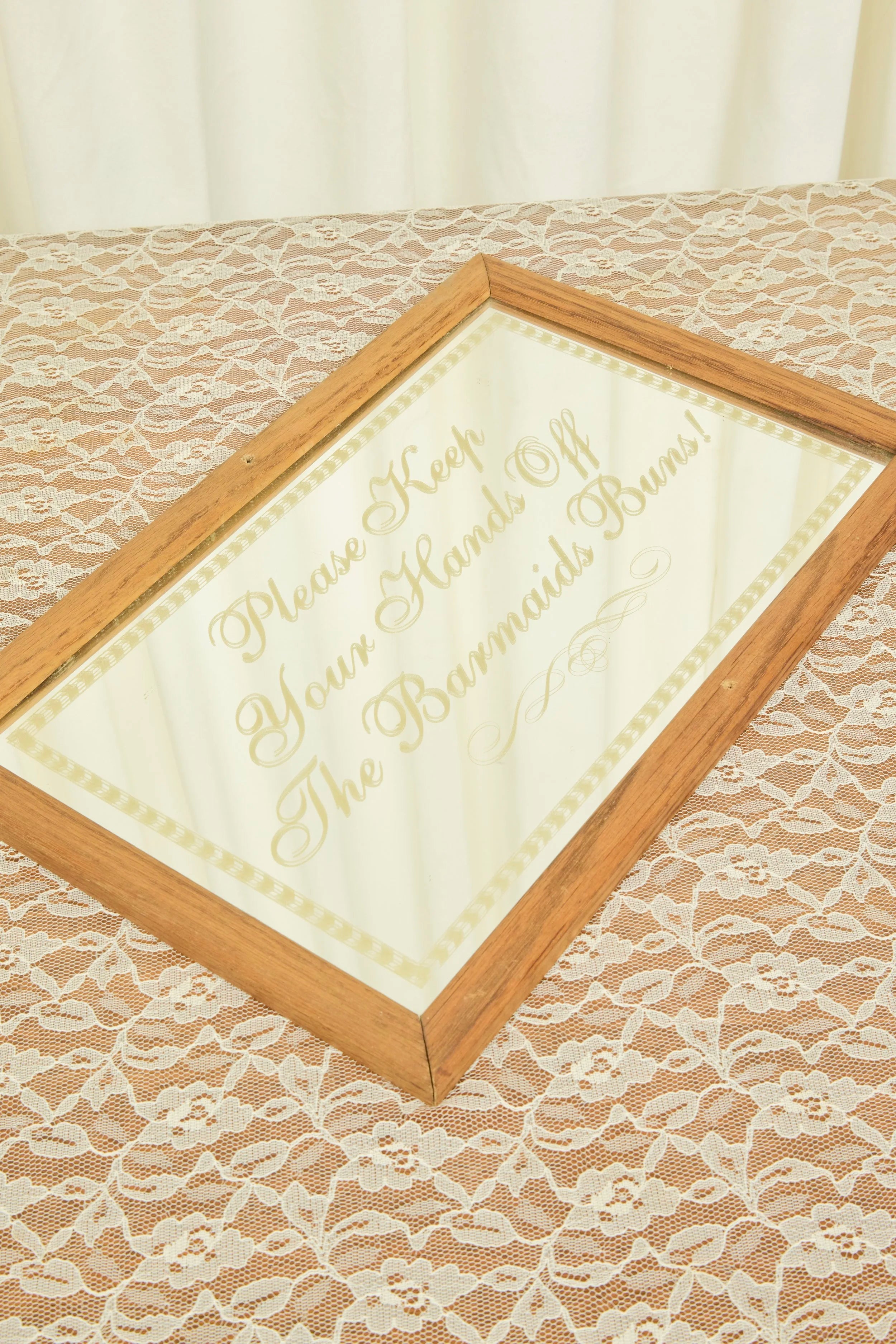 Vintage "Barmaids Buns" Mirror