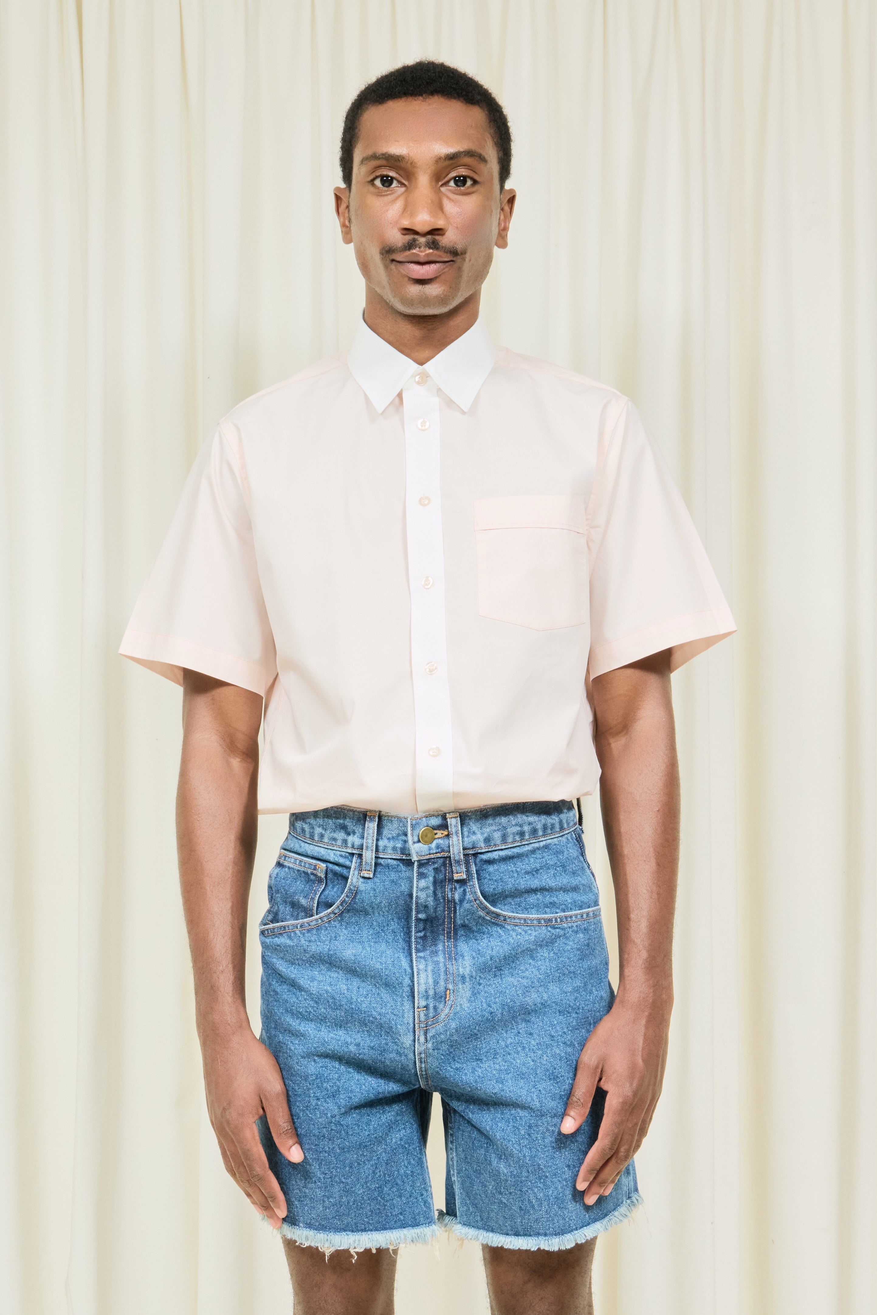 Brad Cutoff Mid Length Jean Short