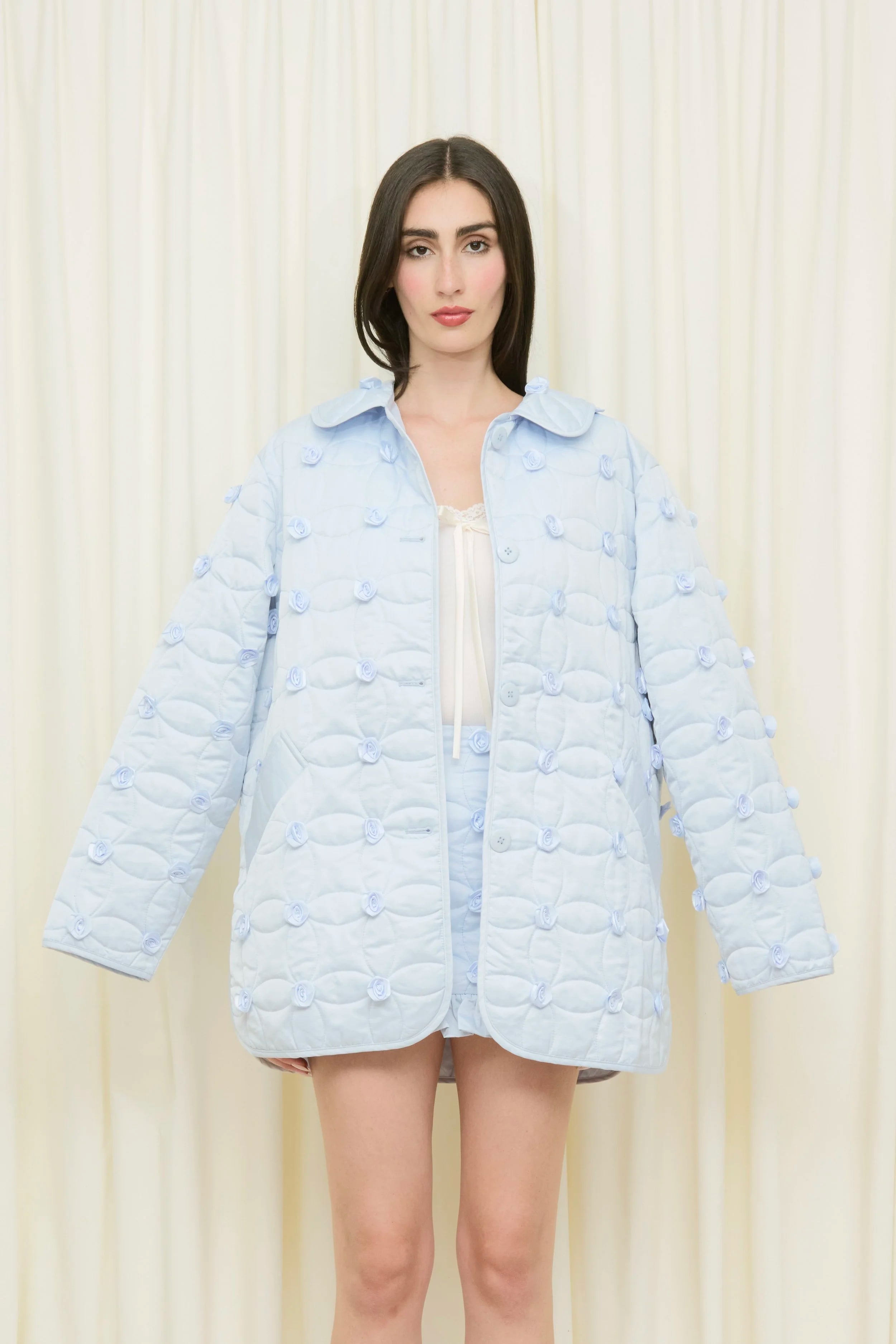 Matilda Quilted Rosette Mini Skirt