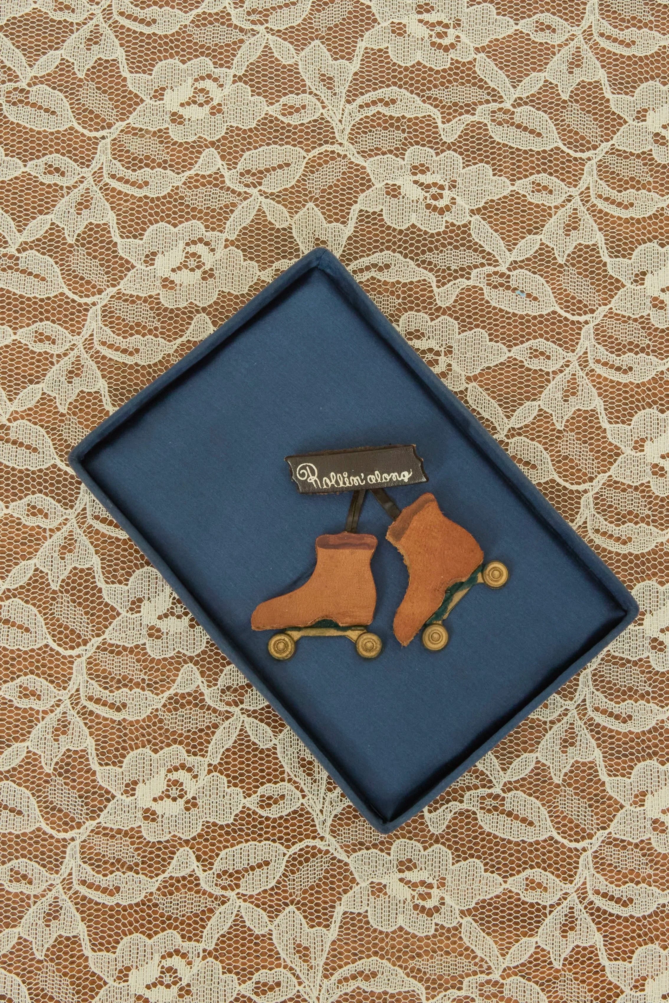 Vintage "Rollin' Along" Leather Brooch